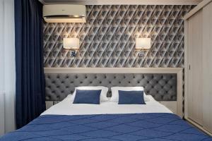 Ένα ή περισσότερα κρεβάτια σε δωμάτιο στο Eurohotel