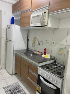 Kuchyň nebo kuchyňský kout v ubytování Apartamento Completo - Piscina, Pet Friendly, Academia No coração da Cidade + 2 fotografie