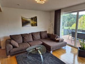 Ein Sitzbereich in der Unterkunft Ferienhaus Seefried
