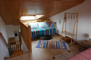 Posteľ alebo postele v izbe v ubytovaní grand studio duplex avec jardin