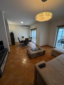 TV a/nebo společenská místnost v ubytování Casa Vila Sul AE + 13 fotografií