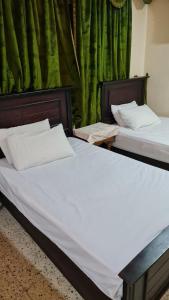 Katil atau katil-katil dalam bilik di Muse& pyramids view inn