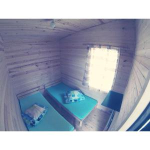 Tempat tidur dalam kamar di Chill Up