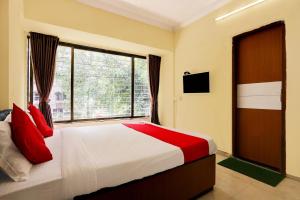 Postel nebo postele na pokoji v ubytování Hotel O Lal Sai Residency