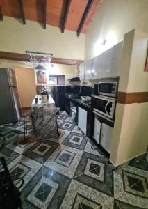 Kuchyň nebo kuchyňský kout v ubytování La casa de Aldo y Paty