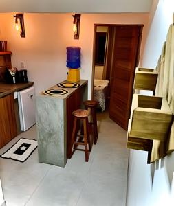 Køkken eller tekøkken på Apto Sossego - Barbosa acomodações + 5 billeder