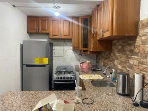 Kuchyň nebo kuchyňský kout v ubytování Hostal Maracay San Salvador