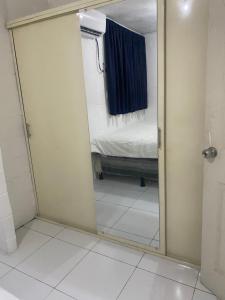 Postel nebo postele na pokoji v ubytování Hostal Maracay San Salvador