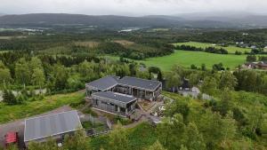 an aerial view of a house on a hill at Architect designed micro house in Skage