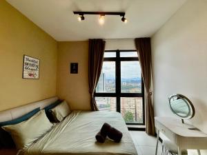 Postel nebo postele na pokoji v ubytování Neu Suites Service Apartment