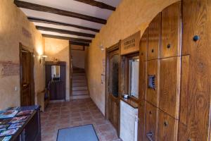 a hallway of a house with wooden walls and floors at Zumargain in Asteasu