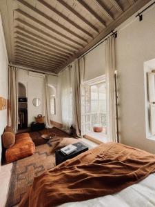 Postel nebo postele na pokoji v ubytování Riad Berbère Marrakech