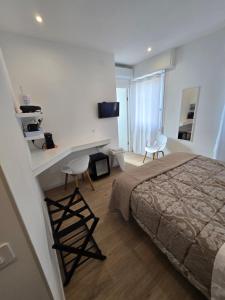 Letto o letti in una camera di Athena