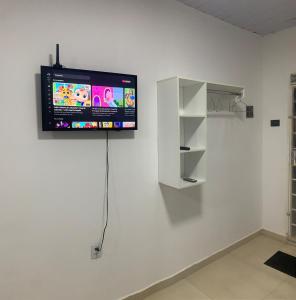 Μια τηλεόραση ή/και κέντρο ψυχαγωγίας στο Loft novo e centralizado