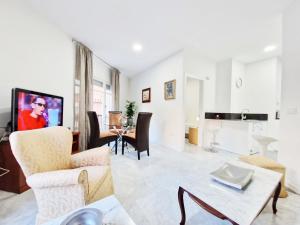 Et tv og/eller underholdning på Alojamientos Fenix