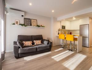 Kuchyňa alebo kuchynka v ubytovaní Apartamentos Aranda - La Cepa I - II