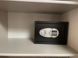 a toaster on a shelf in a room at Rosari Spada Suite sec XVI in Spoleto