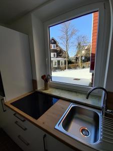 Η κουζίνα ή μικρή κουζίνα στο Jesses Harzsuite