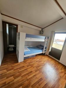 Ένα ή περισσότερα κρεβάτια σε δωμάτιο στο Apartment Mamma Mia