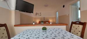 Posteľ alebo postele v izbe v ubytovaní Balassa Családi Apartman