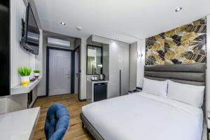 Postel nebo postele na pokoji v ubytování Dedem Hotel Premium - Çorlu