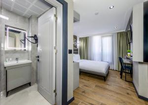 Postel nebo postele na pokoji v ubytování Dedem Hotel Premium - Çorlu