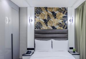 Postel nebo postele na pokoji v ubytování Dedem Hotel Premium - Çorlu