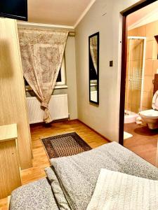 Postel nebo postele na pokoji v ubytování Dodi house