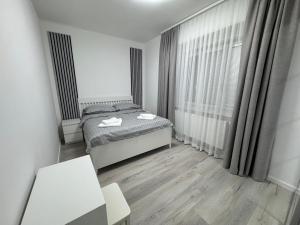 Posteľ alebo postele v izbe v ubytovaní Modern, comfortable apartments near the metro