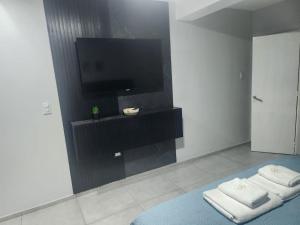 Hotel El Paraiso Boutique客房内的一张或多张床位