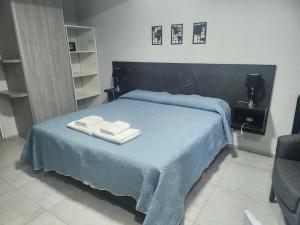 Hotel El Paraiso Boutique客房内的一张或多张床位