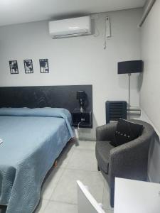 Hotel El Paraiso Boutique客房内的一张或多张床位