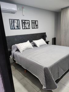 Hotel El Paraiso Boutique客房内的一张或多张床位