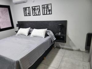 Hotel El Paraiso Boutique客房内的一张或多张床位