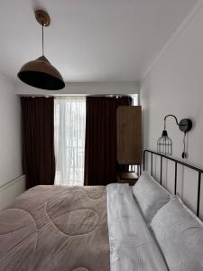 Postel nebo postele na pokoji v ubytování Apartment in Bakuriani