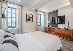 Ένα ή περισσότερα κρεβάτια σε δωμάτιο στο Charming 2 Bed Apartment