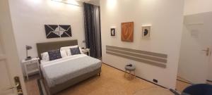 a bedroom with a bed in a room at Room and Suite - BARI CENTRALE - in Bari
