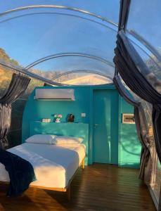 a bedroom on a boat with a bed in it at Sial Skynest in Vlorë +21 photos