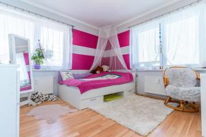 Postel nebo postele na pokoji v ubytování TOP KOMFORT ubytovanie v blízkosti centra + 23 fotografií