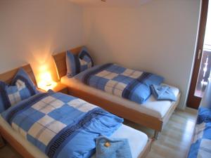 Кровать или кровати в номере Appartments Hilton