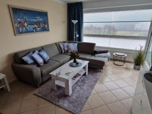 Posezení v ubytování Ferienwohnung - Frische Brise 04 01