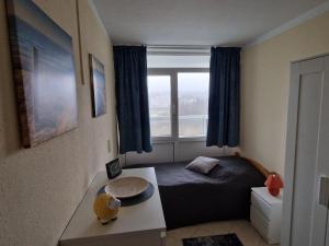 Posezení v ubytování Ferienwohnung - Frische Brise 04 01
