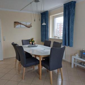 Posezení v ubytování Ferienwohnung - Frische Brise 04 01