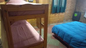 Ένα ή περισσότερα κρεβάτια σε δωμάτιο στο Dos Soles +3 φωτογραφίες