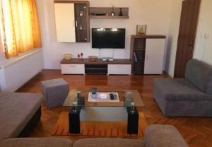 Kuchyňa alebo kuchynka v ubytovaní Apartments Ognjen
