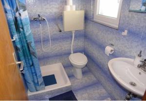 Kúpeľňa v ubytovaní Apartments Ognjen