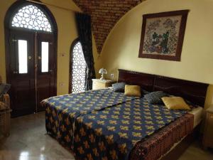 Ένα ή περισσότερα κρεβάτια σε δωμάτιο στο Luxor Experience Guest House +37 φωτογραφίες