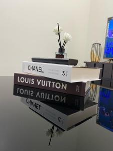 a stack of books sitting on top of a table at Jungle Escape in Manila
