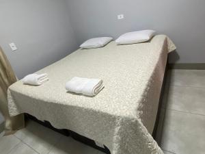 Postelja oz. postelje v sobi nastanitve Deck Pousada