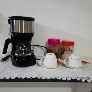 Kaffe- og tefaciliteter på Apartamento aconchegante em Cuiabá